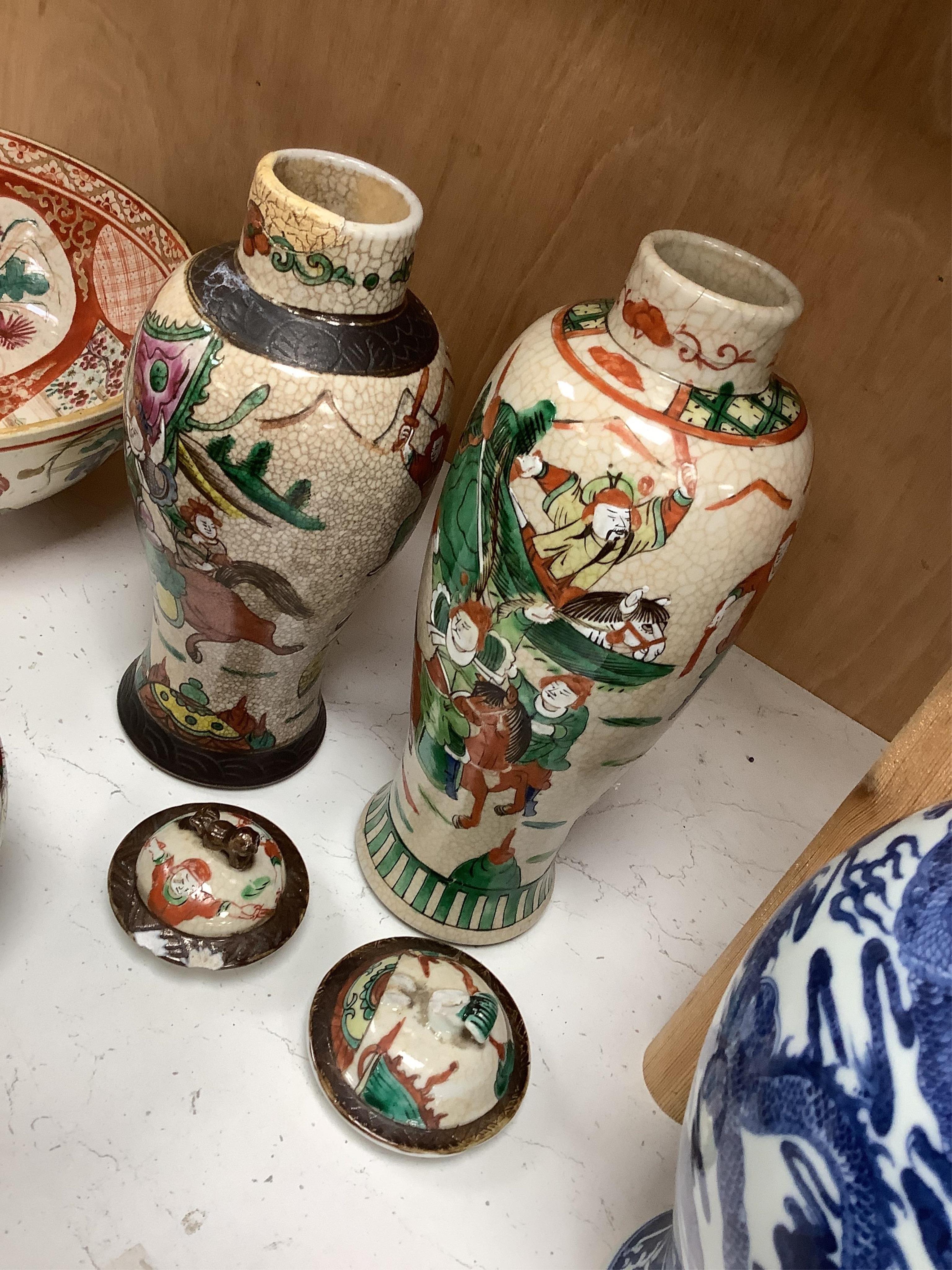 Two Chinese crackle glaze vases and covers, four jars one with cover and a Japanese Kutani bowl, bowl 30cm diameter